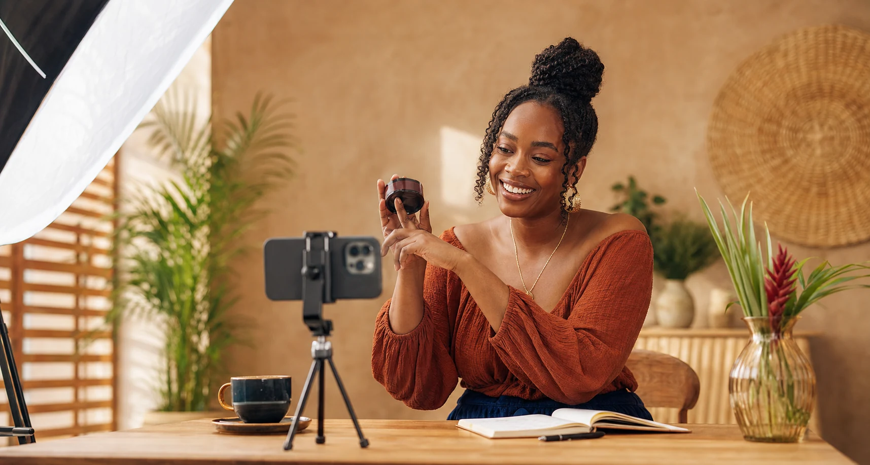 A creator preparing a short video in a warm, sunlit studio